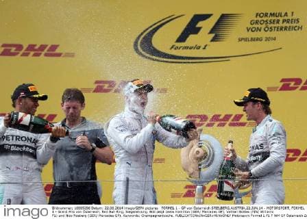 FORMEL 1 - GP von Österreich SPIELBERG,AUSTRIA,22.JUN.14 - MOTORSPORT, FORMEL 1 - Grand Prix von Österreich, Red Bull Ring, Siegerehrung. Bild zeigt Lewis Hamilton (GBR Mercedes GP), Valtteri Bottas (FIN Williams F1) und Nico Rosberg (GER Mercedes GP). Keywords: Champagnerdusche. 