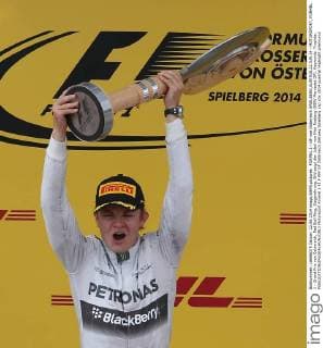 FORMEL 1 - GP von Österreich SPIELBERG,AUSTRIA,22.JUN.14 - MOTORSPORT, FORMEL 1 - Grand Prix von Österreich, Red Bull Ring, Siegerehrung. Bild zeigt den Jubel von Nico Rosberg (GER Mercedes GP). Keywords: Trophäe. 