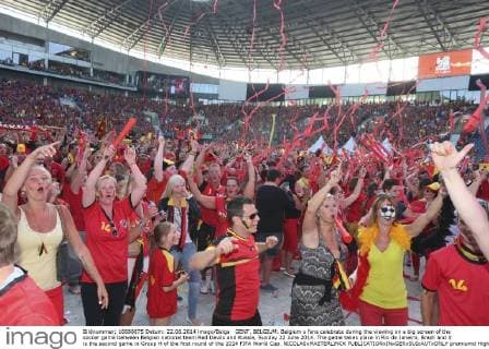 GENT, BELGIUM: Belgium s fans celebrate during the viewing on a big screen of the soccer game between Belgian national team Red Devils and Russia, Sunday 22 June 2014. The game takes place in Rio de Janeiro, Brazil and it is the second game in Group H of the first round of the 2014 FIFA World Cup. NICOLASxMAETERLINCK  premiumd Highlight 04214298