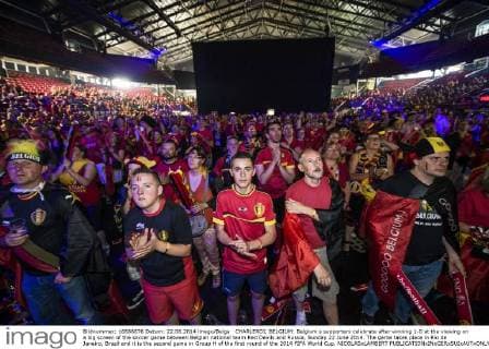 CHARLEROI, BELGIUM: Belgium s supporters celebrate after winning 1-0 at the viewing on a big screen of the soccer game between Belgian national team Red Devils and Russia, Sunday 22 June 2014. The game takes place in Rio de Janeiro, Brazil and it is the second game in Group H of the first round of the 2014 FIFA World Cup. NICOLASxLAMBERT  premiumd Highlight 04214347