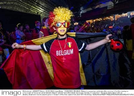 CHARLEROI, BELGIUM: Belgium s supporters celebrate after winning 1-0 at the viewing on a big screen of the soccer game between Belgian national team Red Devils and Russia, Sunday 22 June 2014. The game takes place in Rio de Janeiro, Brazil and it is the second game in Group H of the first round of the 2014 FIFA World Cup. NICOLASxLAMBERT  premiumd Highlight 04214357