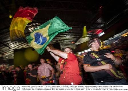 CHARLEROI, BELGIUM: Belgium s supporters celebrate after winning 1-0 at the viewing on a big screen of the soccer game between Belgian national team Red Devils and Russia, Sunday 22 June 2014. The game takes place in Rio de Janeiro, Brazil and it is the second game in Group H of the first round of the 2014 FIFA World Cup. NICOLASxLAMBERT  premiumd Highlight 04214414