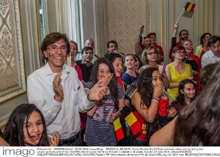 BRUSSELS, BELGIUM: Prime Minister Elio Di Rupo celebrate after scoring during the soccer game as part of the 2014 FIFA World Cup at the Prime Minister s cabinet in Brussels, Sunday 22 June 2014. JONASxROOSENS  04214392