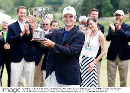 June 22, 2014 - Cromwell, Connecticut, U.S - Kevin Streelman holds the trophy after winning the Travelers Championship at TPC River Highlands in Cromwell, Connecticut. Golf 2014 - Travelers Championship - Final Round - ZUMAw10