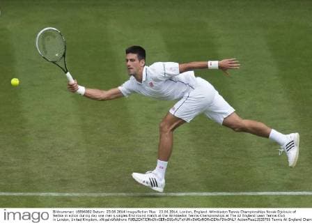 23.06.2014. London, England. Wimbledon Tennis Championships Novak Djokovic of Serbia in action during day one men s singles first round match at the Wimbledon Tennis Championships at The All England Lawn Tennis Club in London, United Kingdom. xNigelxWaldronx  ActionPlus11535706