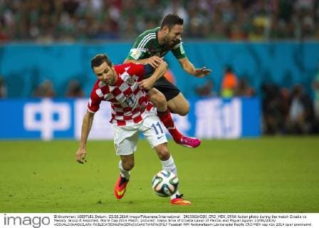 34230614DDI_CRO_MEX_SRNA Action photo during the match Croatia vs Mexico, Group A Reported, World Cup 2014 Match, pictured: Darijo Srna of Croatia Layun of Mexico and Miguel Aguilar 23 06 2014 xOSVALDOxAGUILARx 