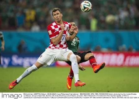 88230614DDI_CRO_MEX_MANDZUKIC Action photo during the match Croatia vs Mexico, Group A Reported, Number 36 of the World Cup 2014 Match, pictured: Mario Mandzukic of Croatia and Paul Aguilar Aguilar of Mexico 23 06 2014 xOSVALDOxAGUILARx 