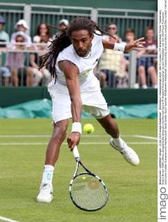 Wimbledon Championships 2014, AELTC,London, ITF Grand Slam Tennis Tournament, Dustin Brown (GER),Aktion,Einzelbild,Ganzkoerper,Hochformat