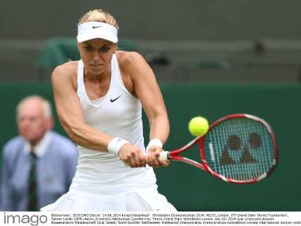 Wimbledon Championships 2014, AELTC,London, ITF Grand Slam Tennis Tournament, Sabine Lisicki (GER),Aktion,Einzelbild,Halbkoerper,Querformat,