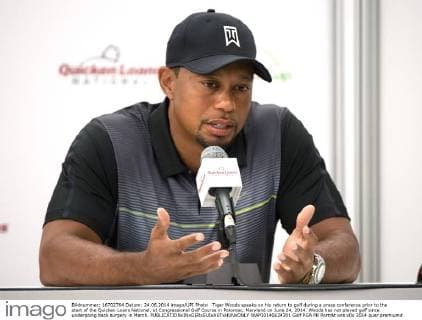 Tiger Woods speaks on his return to golf during a press conference prior to the start of the Quicken Loans National, at Congressional Golf Course in Potomac, Maryland on June 24, 2014. Woods has not played golf since undergoing back surgery in March.  WAP20140624301