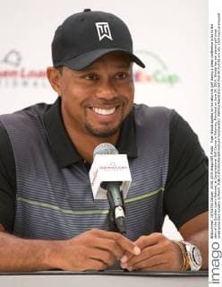 Tiger Woods speaks on his return to golf during a press conference prior to the start of the Quicken Loans National, at Congressional Golf Course in Potomac, Maryland on June 24, 2014. Woods has not played golf since undergoing back surgery in March.  WAP20140624303