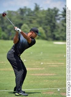Tiger Woods is seen on the practice round prior to the start of the Quicken Loans National, at Congressional Golf Course in Potomac, Maryland on June 24, 2014. This is Tiger Woods first tournament back since undergoing back surgery in March.  WAP20140624311