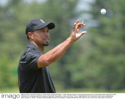 Tiger Woods is seen on the practice round prior to the start of the Quicken Loans National, at Congressional Golf Course in Potomac, Maryland on June 24, 2014. This is Tiger Woods first tournament back since undergoing back surgery in March.  WAP20140624322