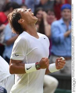 Rafael Nadal celebrates match point on Centre Court. 