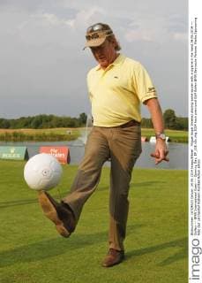 Miguel Angel Jimenez playing some soccer with a cigarre in his hand 24.06.2014 --- Golfen --- BMW International Open --- Opening Day, EP_JSE