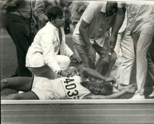 Oct. 10, 1968 - The 1968 Olympic in Mexico - Herriot (Great Britain) Collapses After 3,000 - Meter Steeplechase.: M. Herriot, of Great Britain, is seen as he collapsed at the finish of the 3,000 - metre steeplechase. He had to receive oxygen and was taken from the Olympic Stadium on a stretcher.  - ZUMAk09