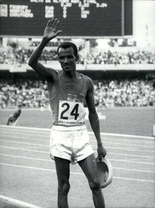 Oct. 10, 1968 - The 1968 Olympics in Mexico. Ethiopian wins the Marathon Gold Medal.: M. Wolde, of Ethiopia, acknowledges the cheers from the crowd after he had won the martahon in 2hrs. 20mins 26.4 secs in the Mexico Olympics.  - ZUMAk09