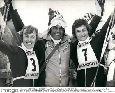 Feb. 02, 1974 - Biggest triumph for the once-King of Alpine skiing: Toni Sailer, winner of three gold medals at the Cortina d Ampezzo Olympics and trainer of the Austrian Olympics and trainer of the Austrian Alpine ski team (center) flashes a big smile as he hugs th downhill race winner David Zwilling (left) and Franz Klammer, race s second (r.). The Austrains scored their biggest triumph at the 23rd Alpine Ski World Championships here by winning one two the most important of all races.  - ZUMAk09