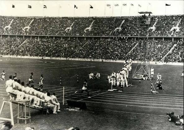 May 26, 1936 - Berlin Olympics - 1936: America s Jesse Owens beating the 100 meter world record - 10.3 seconds.  - ZUMAk09