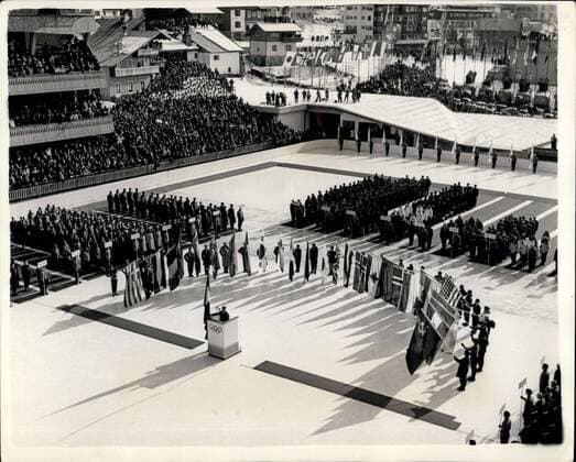 Jan. 28, 1956 - Opening Of Winter Olympic Games: The seventh Winter Olympic Games were opened at Cortina D Ampezzo, Italy, on Thursday, by President Gronchi of Italy. 1,100 athletes from 32 nations were present at the opening ceremony. Photo shows General view of the scene in the Olympic ice stadium at Cortina, showing the Italian ski champion, Miss Giuliana Minuzzo takes the Olympic oath on behalf of the competitors.  - ZUMAk09