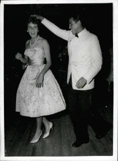 Jul. 05, 1959 - The Wimbledon Men s And Women s Singles Champions Do The Cha-Cha At The Ball: Photo shows. Wimbledon men s and Women s singles champions-Alex Olmedo, of Peru, and Maria Bueno, of Brazil-rock to the rhythm of a Cha-Cha at the Wimbledon Ball, given by the Lawn Tennis Association at the Grosvenor House Hotel, London, last night.  - ZUMAk09