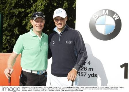 Skisprunglegende Dieter Thoma mit Martin Kaymer (US Open Sieger 2014) 25.06.2014 --- Golfen --- BMW International Open --- ProAm Turnier, EP_JSE