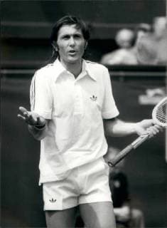 Jun. 06, 1977 - Borg beats Nastase in the mens singles quarter finals at Wimbledon; Photo Shows Ilie Nastase arguing with the referee during todays match against Bjorn Borg. Borg won 6-0, 8-6, 6-3A  - ZUMAk09