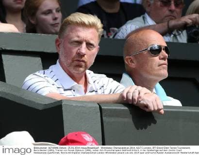 Wimbledon Championships 2014, AELTC,London, ITF Grand Slam Tennis Tournament, Boris Becker (GER), Trainer von Novak Djokovic (SRB), neben ihm Physiotherapeut Gebhard Gritsch, in der Spielerloge auf dem Centre Court Halbkoerper,Querformat,