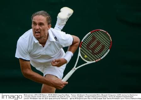 Tennis: Wimbledon Championship 2014, Alexandr Dolgopolov (UKR) during his Gentlemen s Singles second round match at Wimbledon on June 25, 2014, London, England. xKirstenxHolstx xHOCHxZWEIx
