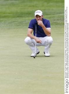 Geburtstagskind Maximilian Kieffer nachdenklich vor einem Put auf dem Green 25.06.2014 --- Golfen --- BMW International Open --- ProAm Turnier, EP_JSE