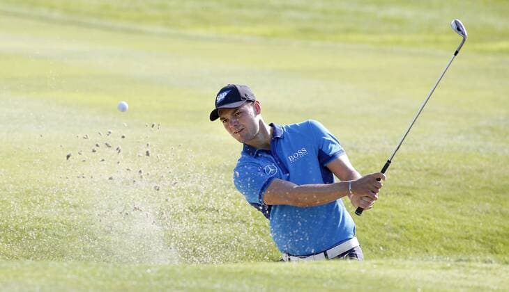 26.06.2014, Pulheim bei Köln: Deutschlands Martin Kaymer beim Bunkerschlag beim Golfturnier BMW International Open auf Gut Lärchenhof.