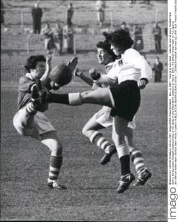Nov. 3, 1957 - Now give your best... was the wish of many football-fans during the European Football-Championship of the ladies in the West-Berlin Stadium on Nov 3, 1957. The British ladies-team on 4:0 against the German ladies-team (British team white trousers)  - ZUMAk09