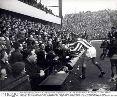 Apr. 28, 1965 - The Maestro Plays His Last Game. Sir Stanley Matthews Retires. To mark the retirement of Sir Stanley Matthews from football at the age of 50 - a farewell match - the Stanley Matthews XI versus a World XI - was played last night at Stoke, where he began his great career 33 years ago. Where he began his great carer 33 years ago. A host of international footballers from all parts of Europe took part in the match. Photo Shows: Sir Stanley Matthews presents a souvenir ball to the spectators just before the kick-off last night.  - ZUMAk09