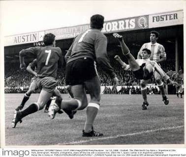 Jul. 13, 1966 - Football. The 1966 World Cup Spain v. Argentine at Villa Park, Birmingham. Albrecht, of Argentine, clears off the line with a scissors kick. Ufart (No 7, Spain) rushes in an Argentine goalkeeper Roma (No 1) looks on.  - ZUMAk09