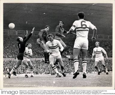 Jul. 13, 1966 - World Cup Football Hungary v Portugal Portugals Jose Augusto is picture (centre in mid air) heading n the first goal for Portugal during the Portugal versus Hungary match at Manchester last night. Others identified here are Hungarian goalkeeper Antal Szentmihaly (No. 1) and Ferenc Sipos (No. 6) of Hungary. Portugal won 3-1  - ZUMAk09