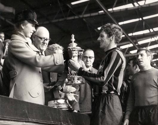 Apr. 26, 1969 - Princess Anne presents the F.A. Cup to Tony Book the Manchester City Captain at London, Wembley today: At London, Wembley today Manchester City beat Leicester City by 1-0 in the F.A. Cup Final. Photo shows Princess Anne seen presenting the F.A. Cup to the Manchester City Captain Tony Book after they had beat Leicester City by 1-0.  - ZUMAk09