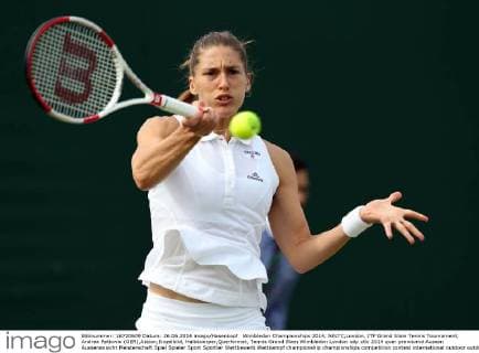 Wimbledon Championships 2014, AELTC,London, ITF Grand Slam Tennis Tournament, Andrea Petkovic (GER),Aktion,Einzelbild, Halbkoerper,Querformat,
