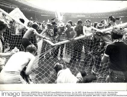 Jun. 04, 1977 - Scots Supporters Go Wild At London, Wembley After Scotland Beat England. After Scotland had beat on England 2-1 at London, Wembley today, Scots supporters invaded the pitch, and goalposts were pulled down. Photo Shows: The scene at London, Wembley as supporters pulled down the goalposts. after today s match.  - ZUMAk09