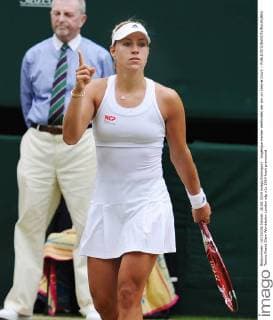 Angelique Kerber celebrates her win on Centre Court. - 