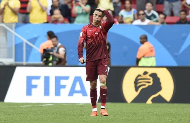 (140626) -- BRASILIA, June 26, 2014 (Xinhua) -- Portugal s Cristiano Ronaldo reacts after a Group G match between Portugal and Ghana of 2014 FIFA World Cup at the Estadio Nacional Stadium in Brasilia, Brazil, June 26, 2014. Portugal won 2-1 over Ghana on Thursday. (Xinhua Qi Heng)(pcy) (SP)BRAZIL-BRASILIA-WORLD CUP 2014-GROUP G-PORTUGAL VS GHANA 