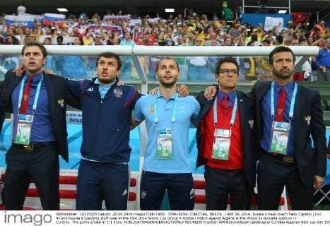 ITAR-TASS: CURITIBA, BRAZIL. JUNE 26, 2014. Russia s head coach Fabio Capello (2nd R) and Russia s coaching staff seen in the FIFA 2014 World Cup Group H football match against Algeria at the Arena da Baixada stadium in Curitiba. The game ended in 1:1 draw.  RE148830