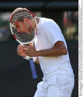 Wimbledon Championships 2014, AELTC,London, ITF Grand Slam Tennis Tournament, Grigor Dimitrov (BUL) macht die Faust und jubelt,Jubel,Emotion, Einzelbild,Halbkörper,Hochformat,kurios,