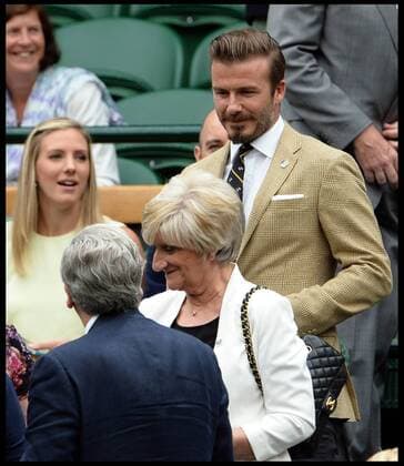 28 06 2014, Wimbledon, London, United Kingdom. David Beckham with his mother Sandra in the Royal box on Day 6 of the Wimbledon Tennis Championship. AndrewxParsonsx xi-Images  IIM-2540-0015