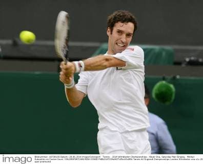 Tennis - 2014 Wimbledon Championships - Week One, Saturday Men Singles, Mikhail Kukushkin on Centre Court. COLORSPORT ANDREW COWIE 