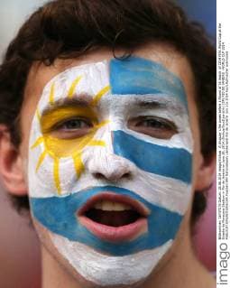 A Uruguay s fan poses before a Round of 16 match of 2014 FIFA World Cup at the Estadio do Maracana Stadium in Rio de Janeiro on June 28, 2014.(Xinhua XuxZijian)(rh) (SP) RIO DE JANEIRO -WORLD CUP 2014 