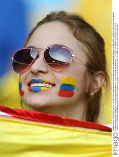 A Colombia s fan poses before a Round of 16 match of 2014 FIFA World Cup at the Estadio do Maracana Stadium in Rio de Janeiro on June 28, 2014.(Xinhua XuxZijian)(rh) (SP) RIO DE JANEIRO -WORLD CUP 2014 