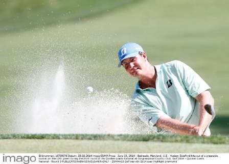 June 28, 2014 - Bethesda, Maryland, U.S - Hudson Swafford hits out of a greenside bunker on the 12th green during the third round of the Quicken Loans National at Congressional Country Club. Golf 2014 - Quicken Loans National - Round 3 - ZUMAw10