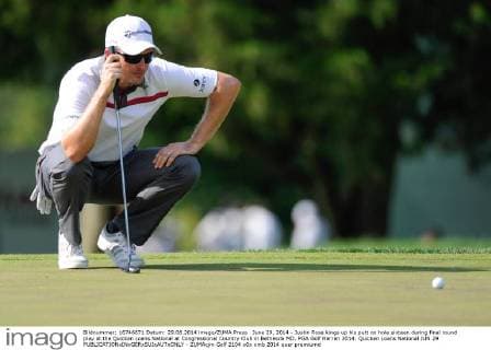 June 29, 2014 - Justin Rose kings up his putt on hole sixteen during final round play at the Quicken Loans National at Congressional Country Club in Bethesda MD. PGA Golf Herren 2014: Quicken Loans National JUN 29 - ZUMAcjm