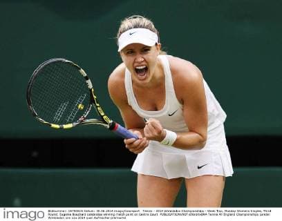 Tennis - 2014 Wimbledon Championships - Week Two, Monday Womens Singles, Third Round: Eugenie Bouchard celebrates winning match point on Centre Court 