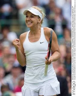 Tennis: Wimbledon Championship 2014, Sabine Lisicki of Germany celebrates after winning her Ladies Singles fourth round match on day seven of the Wimbledon Lawn Tennis Championships at the All England Lawn Tennis and Croquet Club at Wimbledon on June 30, 2014, London, England. xKirstenxHolstx xHOCHxZWEIx